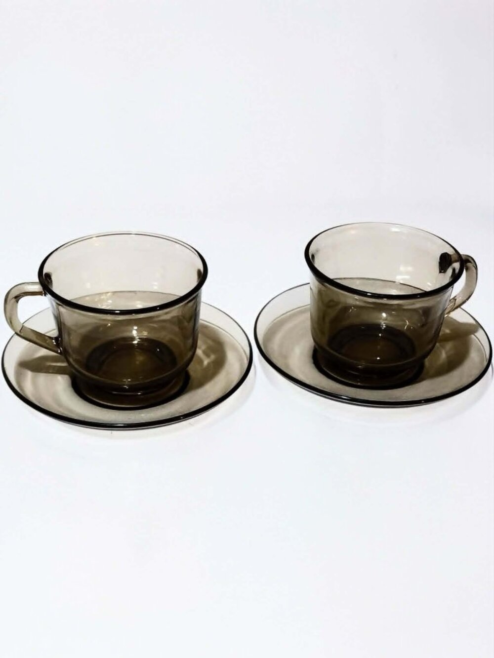 Arcoroc France glass teacups and saucers in smokey brown glass